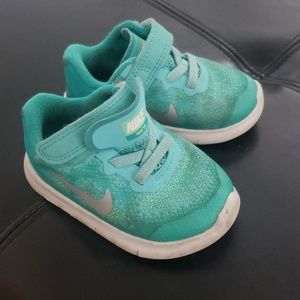 Turquoise Nikes for Baby